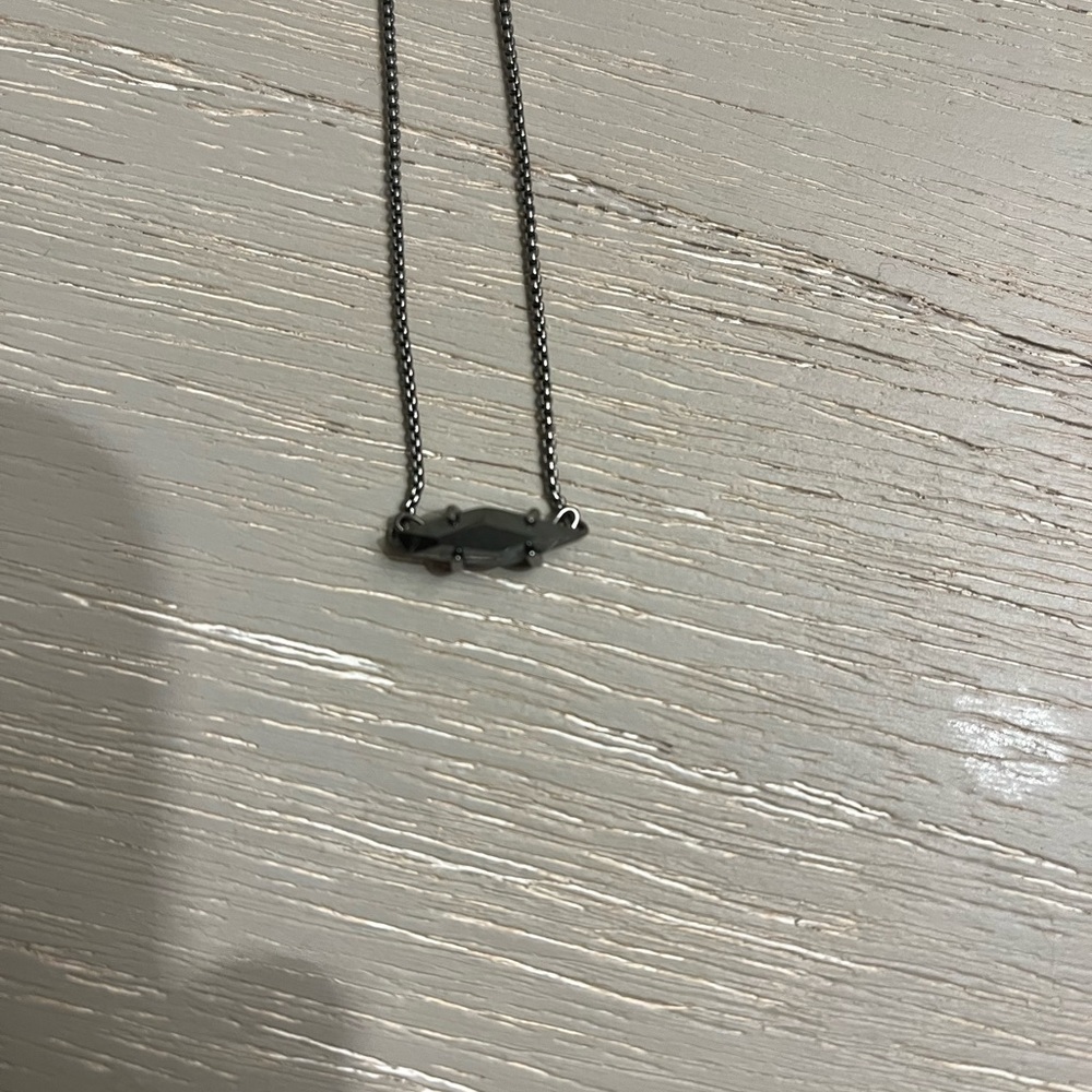 Kendra Scott necklace.